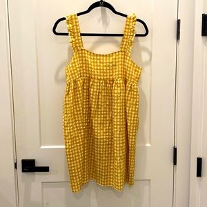 This fun yellow dress will be perfect for any summer outing!